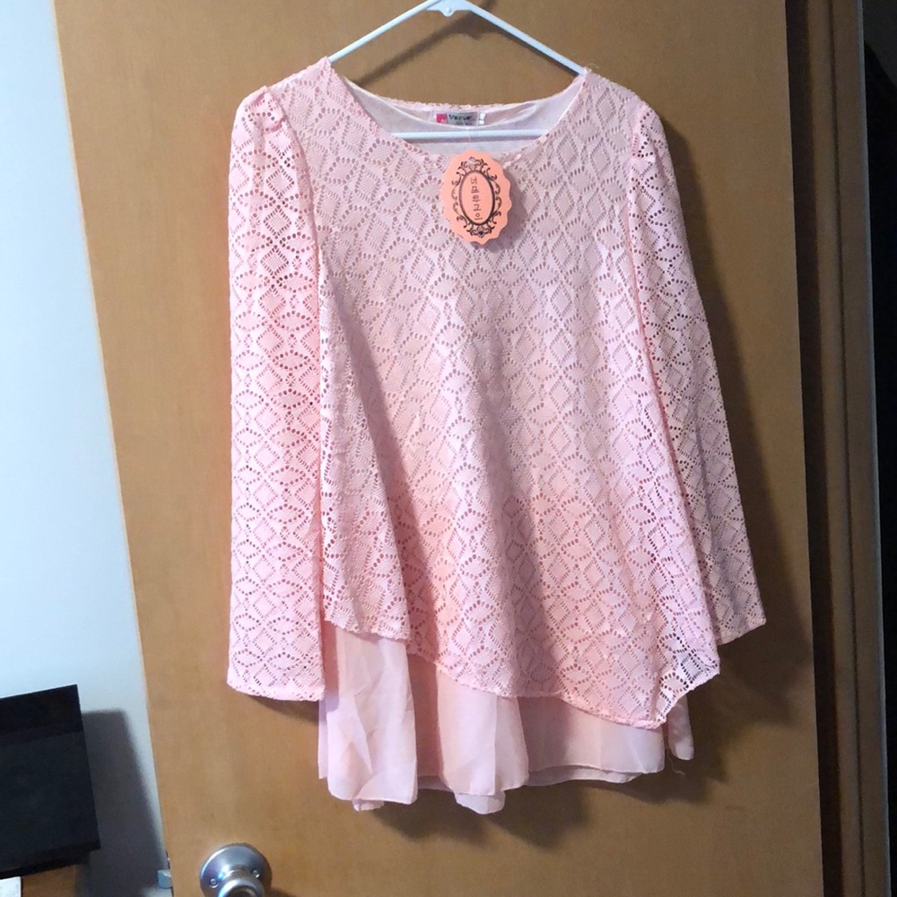 Pale pink blouse with lace overlay
